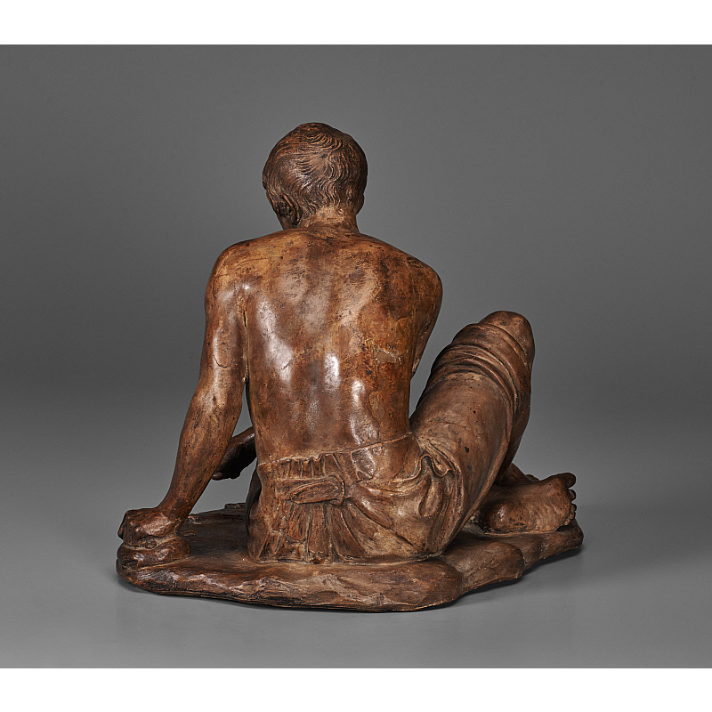 Young Man Seated Slider Image 2